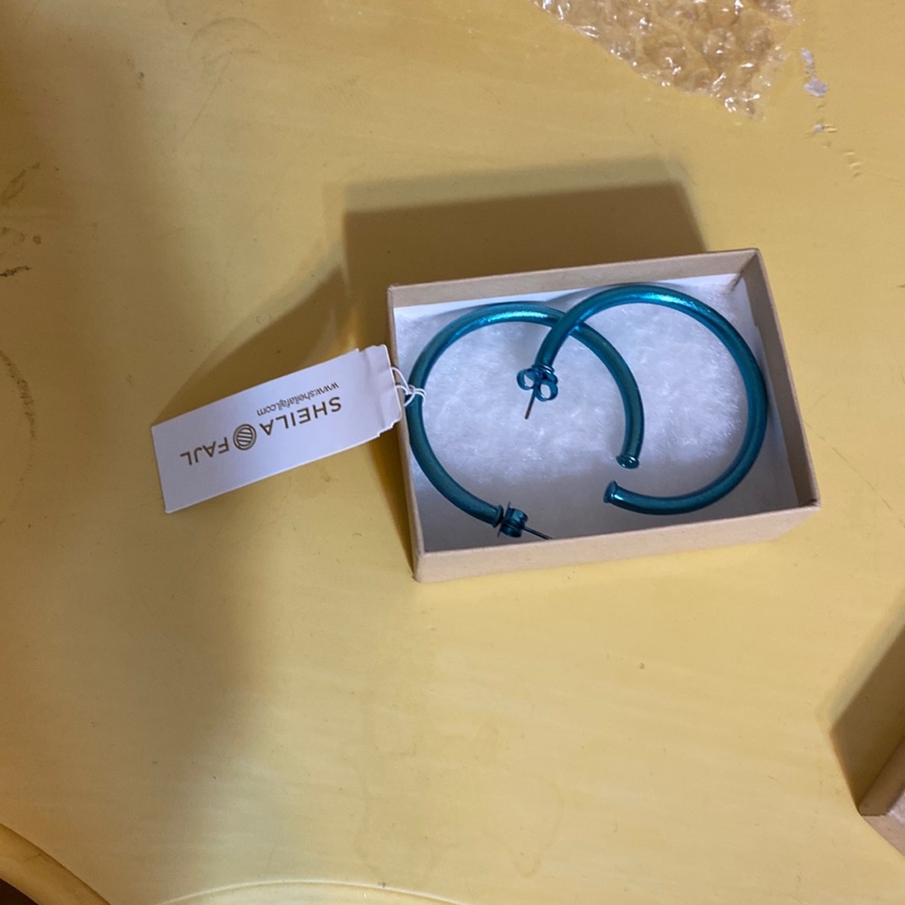Sheila Fajl new blue hoops
